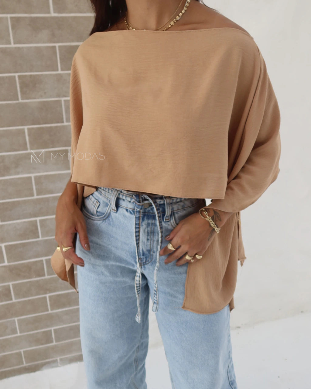 Blusa assimétrica multiformas