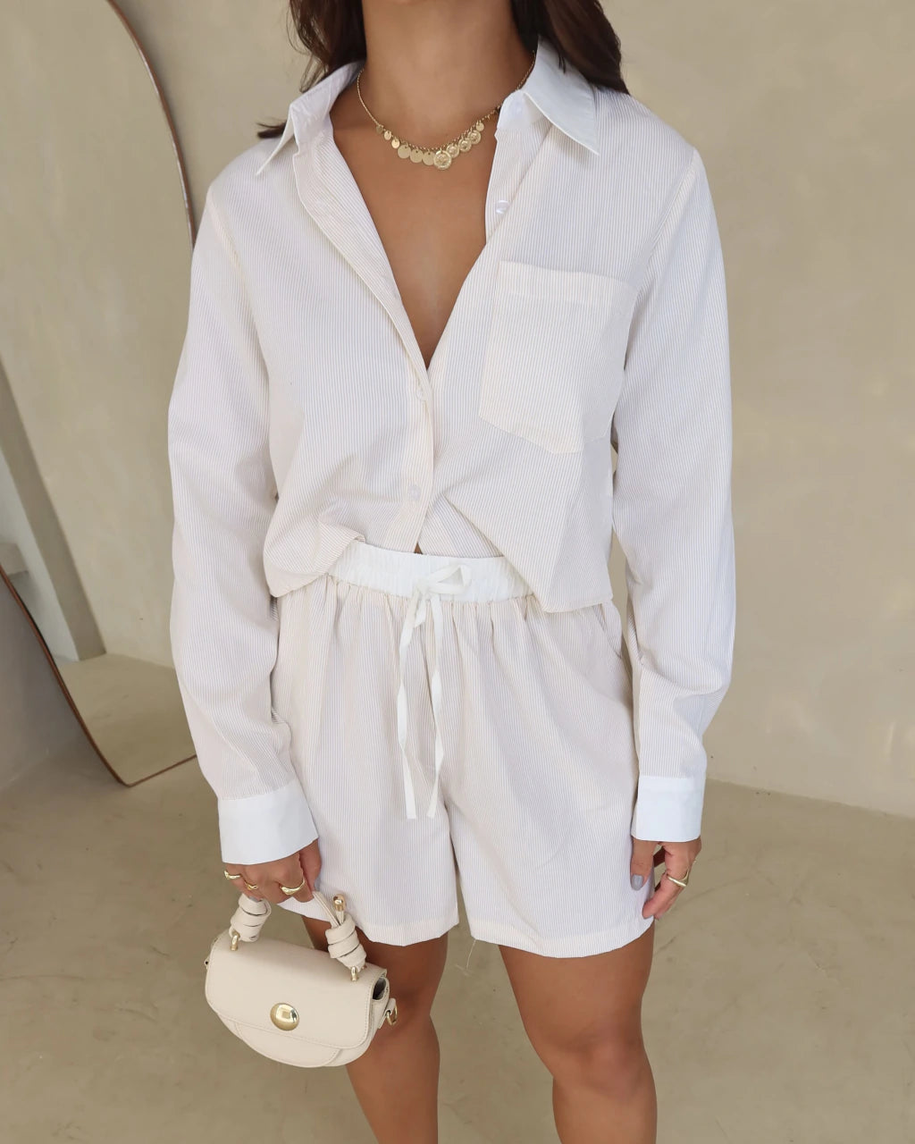 Conjunto camisa cropped e shorts
