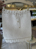 Saia off white trama fechada crochê